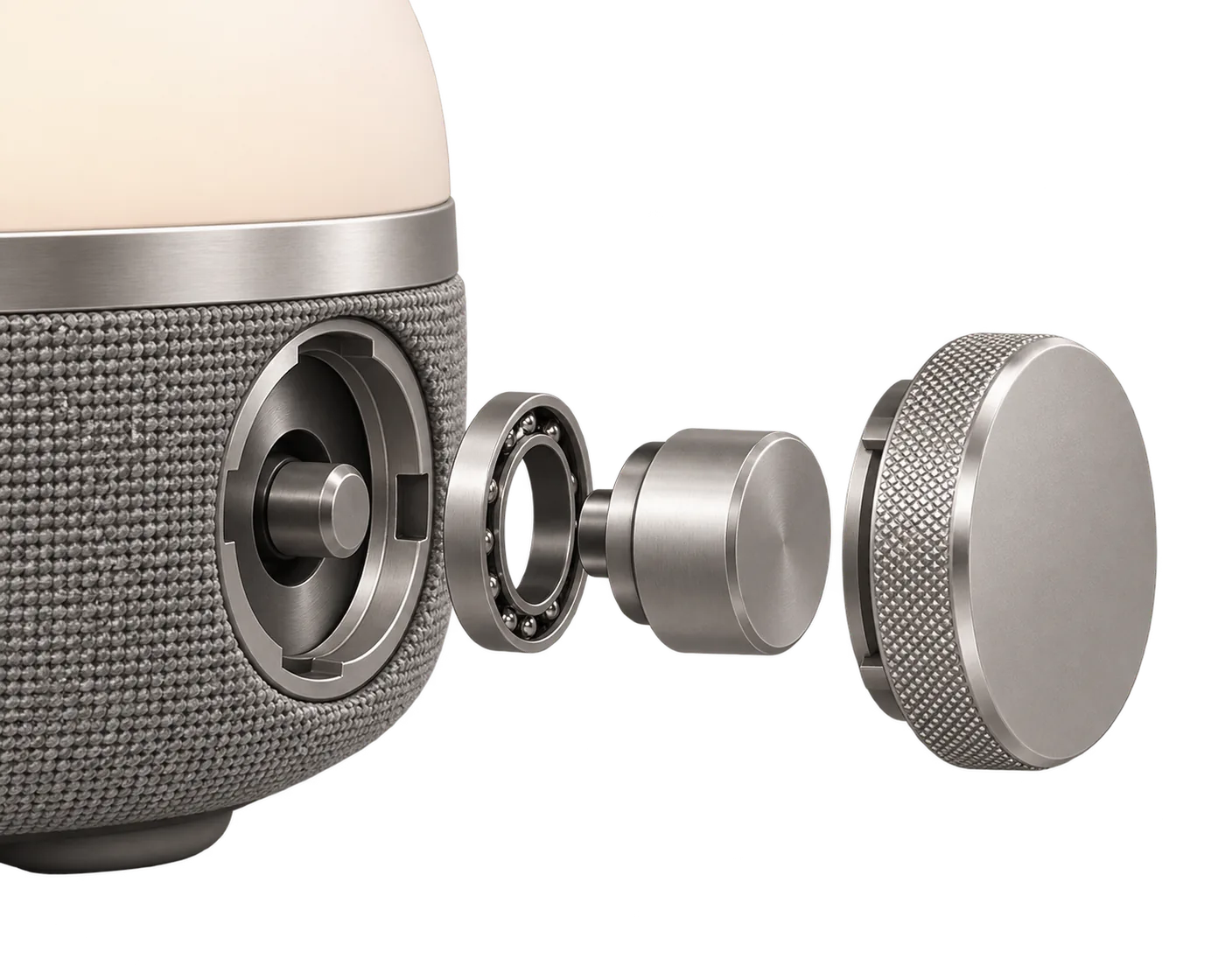 Conceptual exploded view of the outer ring, bearing gap and button core.