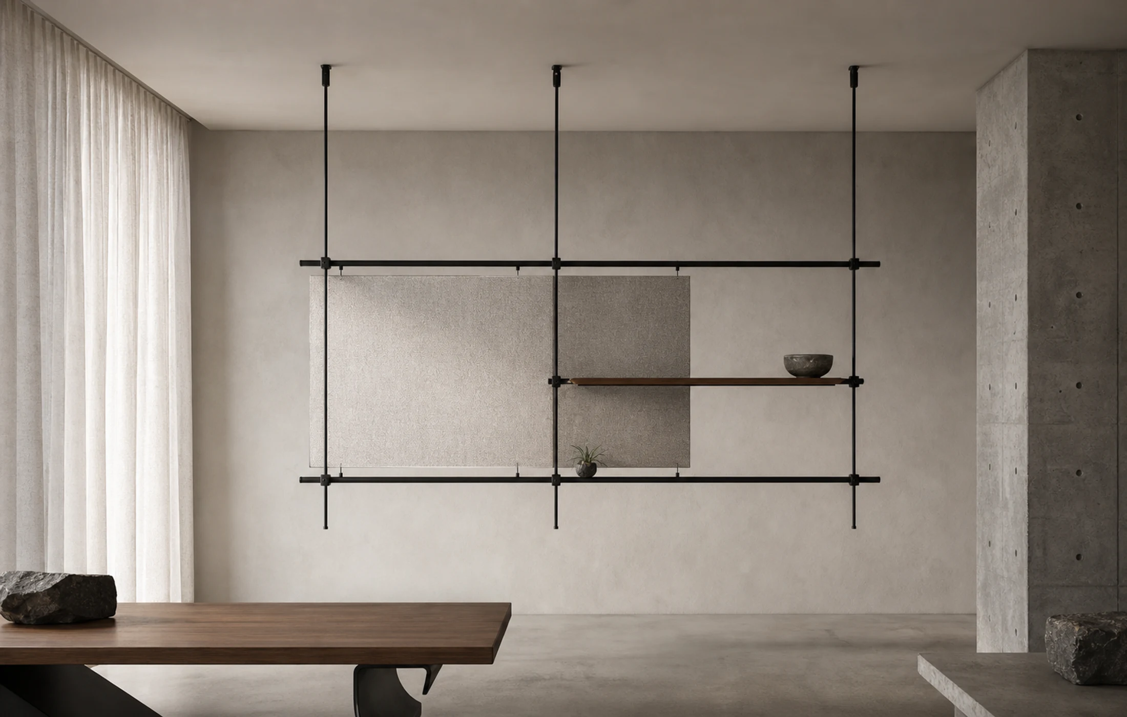 A suspended divider grid with panels and a shelf in a pale interior