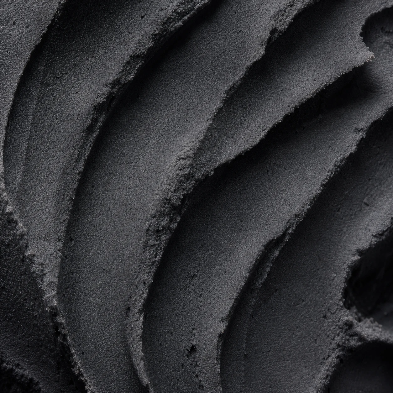 Charcoal powder soap macro texture