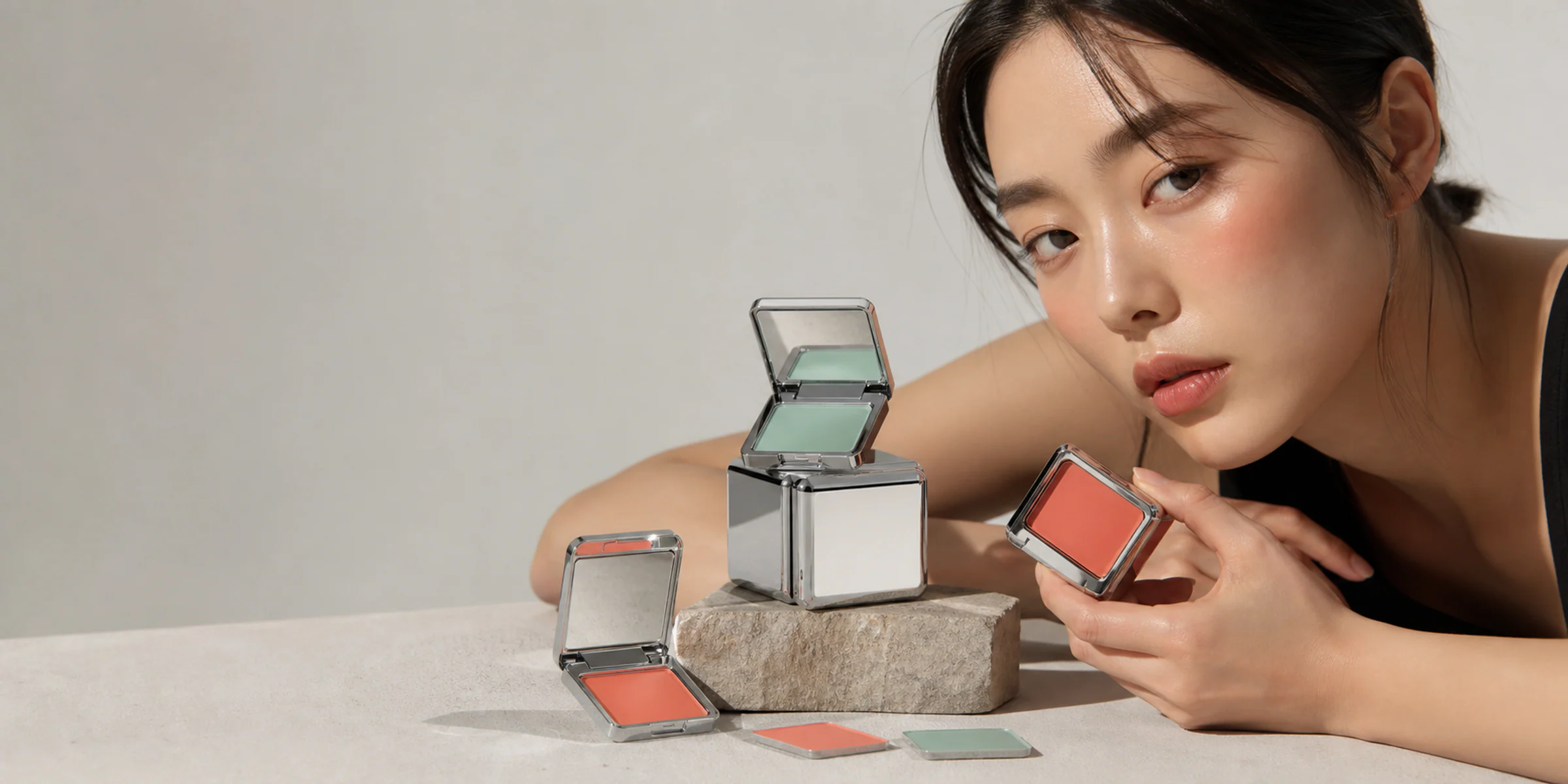 Chrome compact and enamel color tiles for NOMA SKIN OBJECTS in hard daylight