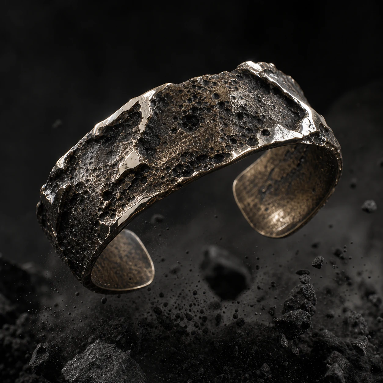 Bronze Relic Cuff with rough crater texture.