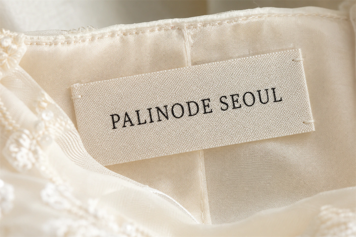 PALINODE SEOUL 직조 라벨 디테일
