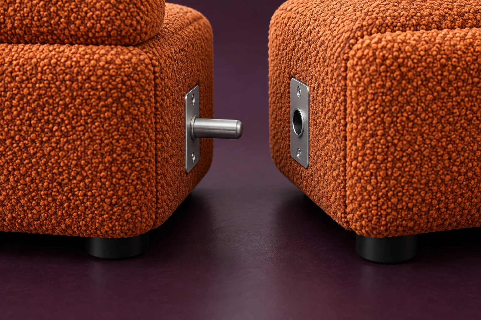 Concept metal connector between two orange sofa modules